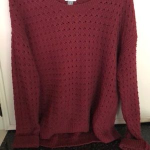 Cute sweater with holes.